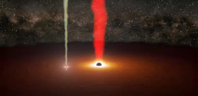 החורים השחורים המקיפים אחד את האחר. לשני החורים השחורים יש סילונים הקשורים אליהם: הגדול יותר בצבע אדום, הקטן בצהוב. בדרך כלל רק הסילון האדום נראה, אבל ב-12 השעות ב-12 בנובמבר 2021 הסילון הקטן היה הדומיננטי, נתן אות ישיר מהחור השחור הקטן יותר, ונצפה לראשונה. קרדיט: NASA/JPL-Caltech/R. Hurt (IPAC) & M. Mugrauer (AIU Jena)